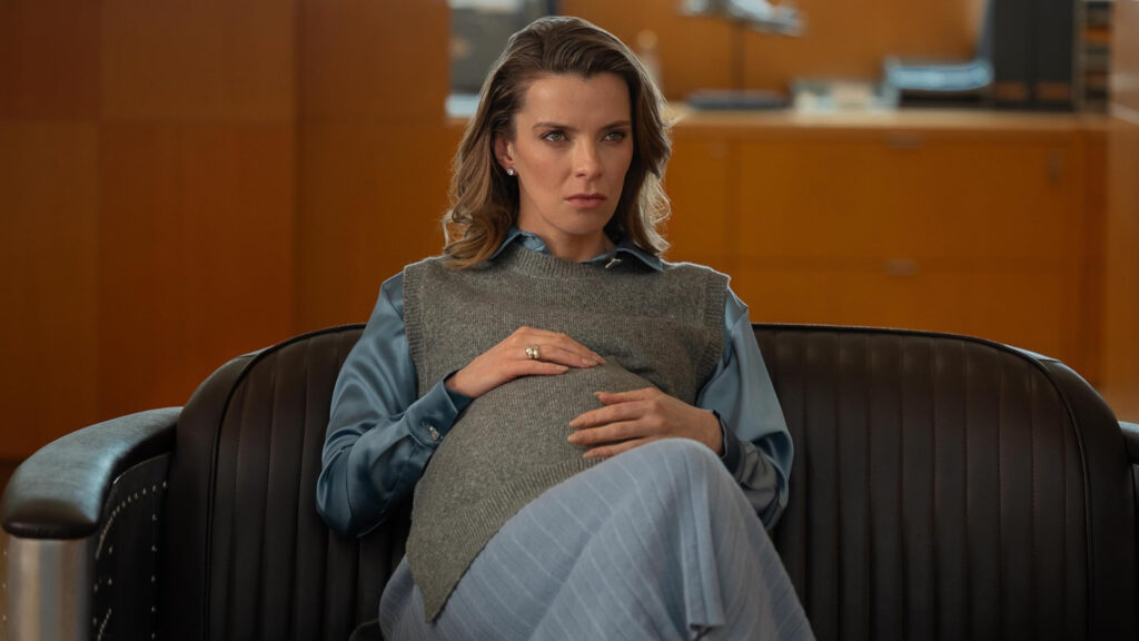 Betty Gilpin as Sydney in Office Romance